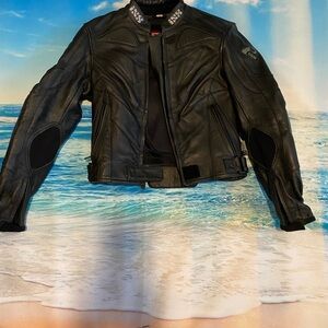 IXS Black Leather Motorcycle Jacket size XS /34
With protection armer insert
